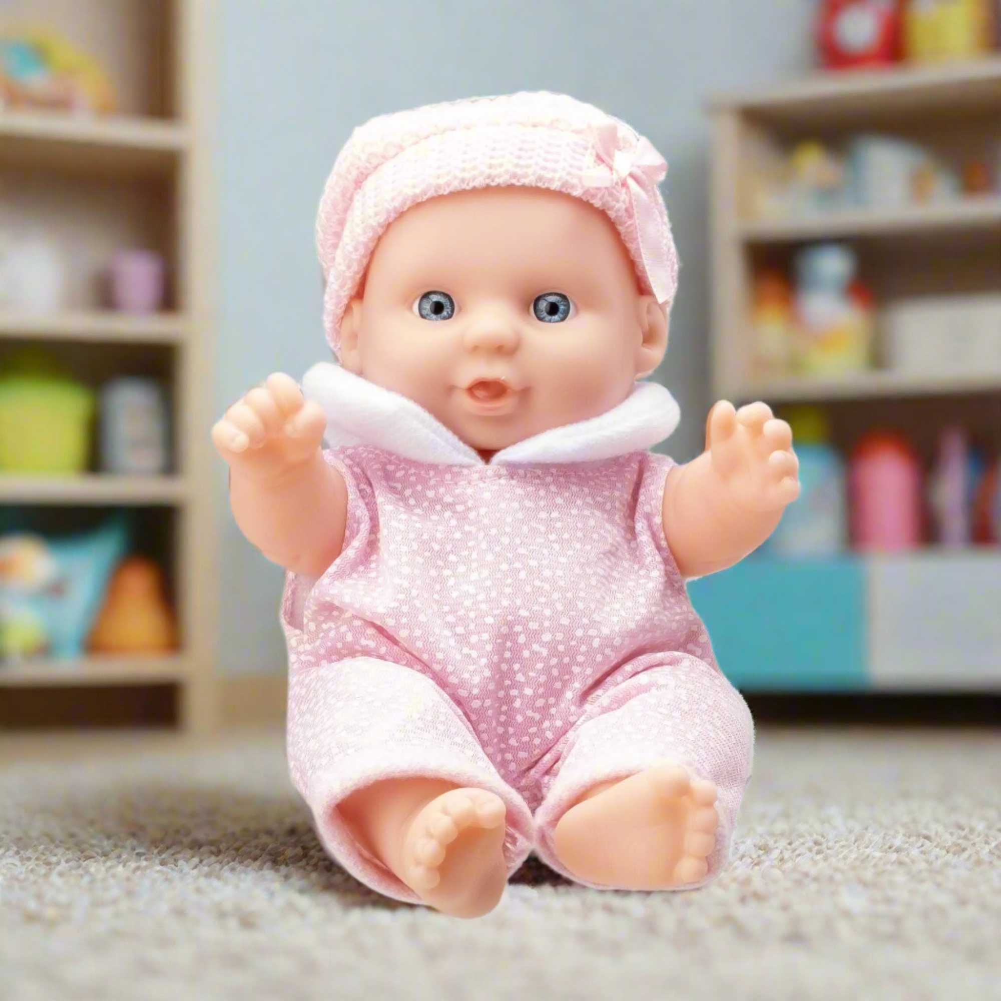 BabyBoo Cutie Baby Doll available in blue and pink outfits, featuring a soft, cuddly body, lifelike facial features, and gentle expression, perfect for nurturing role-play and snuggling.