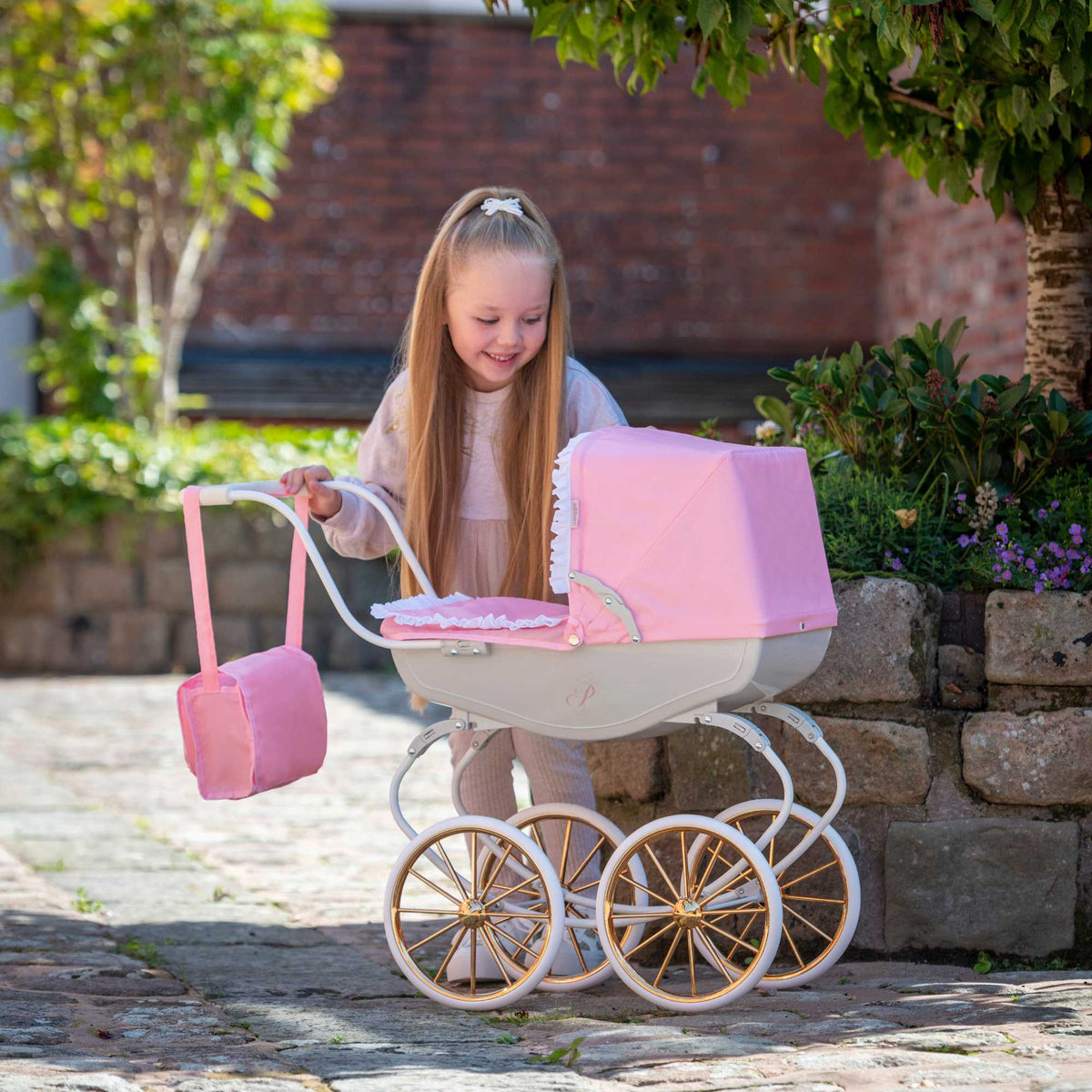 Bella Rosa Cambridge Carriage Dolls Pram - Pink &amp; Rose Gold - Luxurious pink and rose gold pram designed for dolls, offering a stylish and elegant accessory for imaginative play