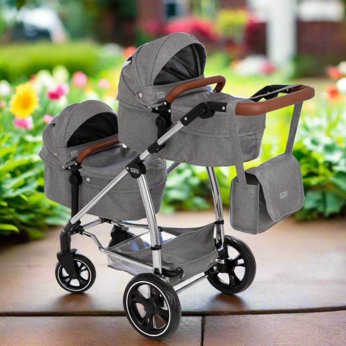 Mamas &amp; Papas Twin Elite Dolls Pram in stylish design with 9 play modes, including options for bassinet, Pushchairs and traditional pram setups, ideal for imaginative doll play.