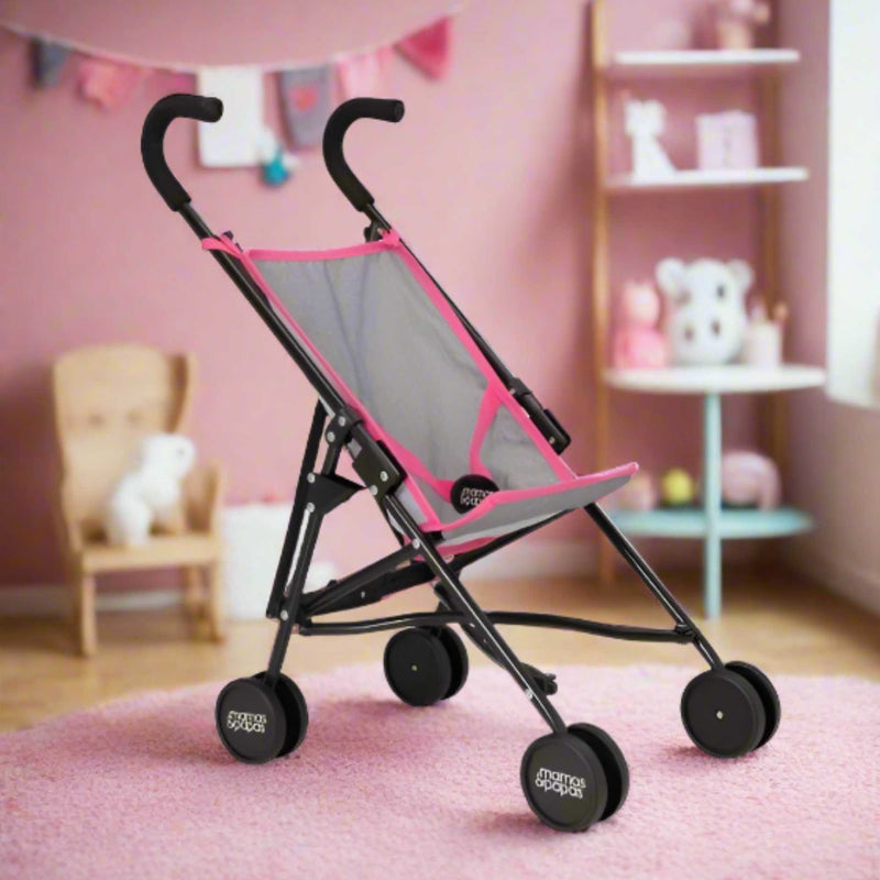 Mamas & Papas Junior Doll Stroller in pink and grey, featuring a foldable and lightweight design for easy storage and portability, ideal for children's imaginative play with dolls.