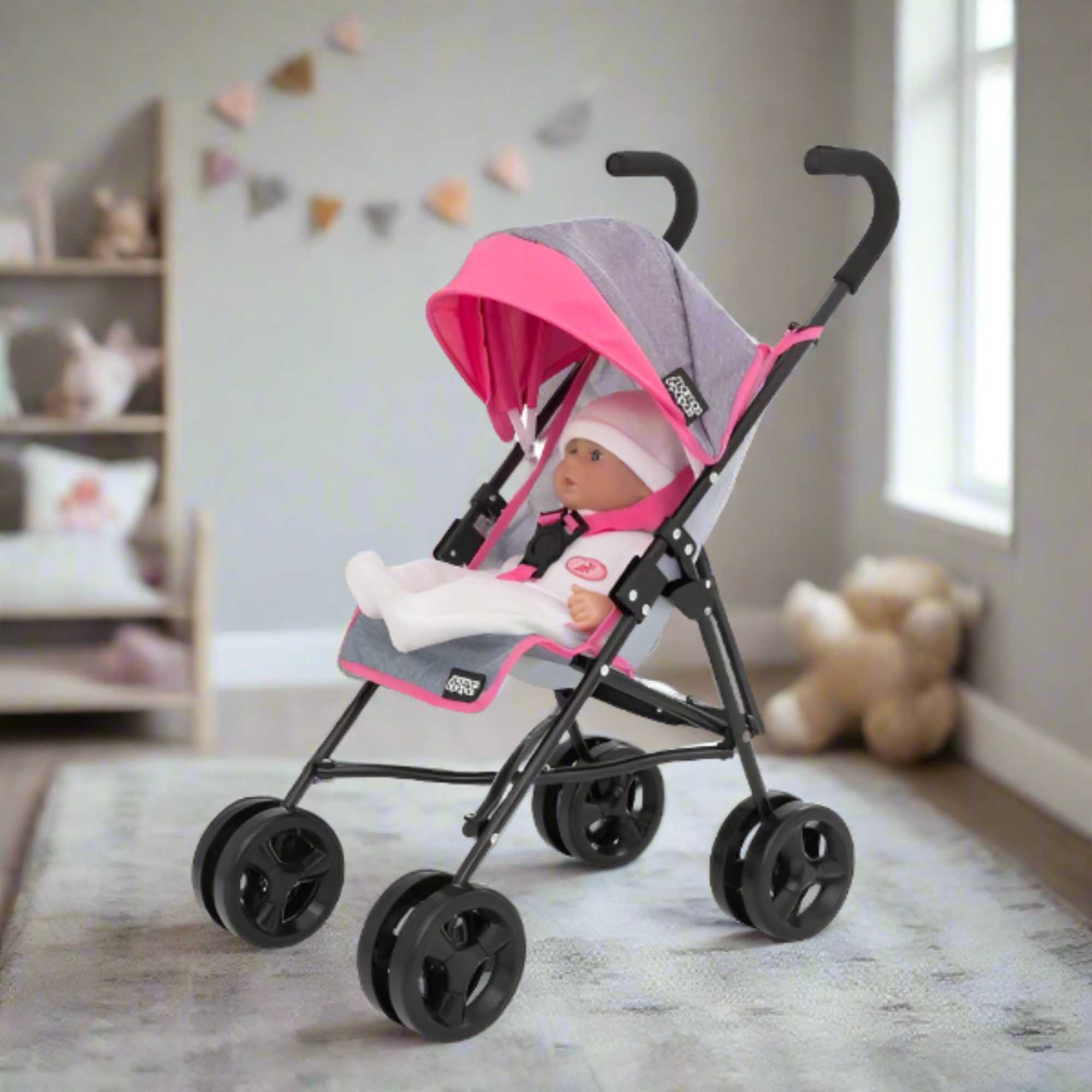 Mamas & Papas Junior Cruise Stroller, designed for children's imaginative play, featuring a sleek and modern design with sturdy frame and smooth-rolling wheels, perfect for pretend outings with dolls.