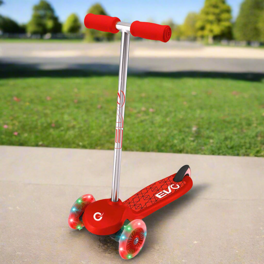 EVO Light Up Move N Groove Scooter for Ages 2 and Up with Lean-to-Steer System and LED Wheels, perfect for young children’s outdoor adventures.