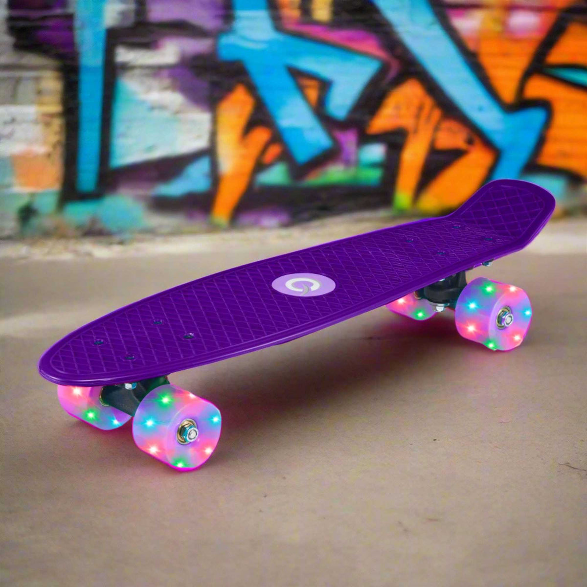 Children’s EVO 22-inch Penny Board with light-up wheels, showcasing a compact design and vibrant retro style, perfect for young riders. The board features a textured grip surface and smooth, illuminated wheels that light up during movement. 