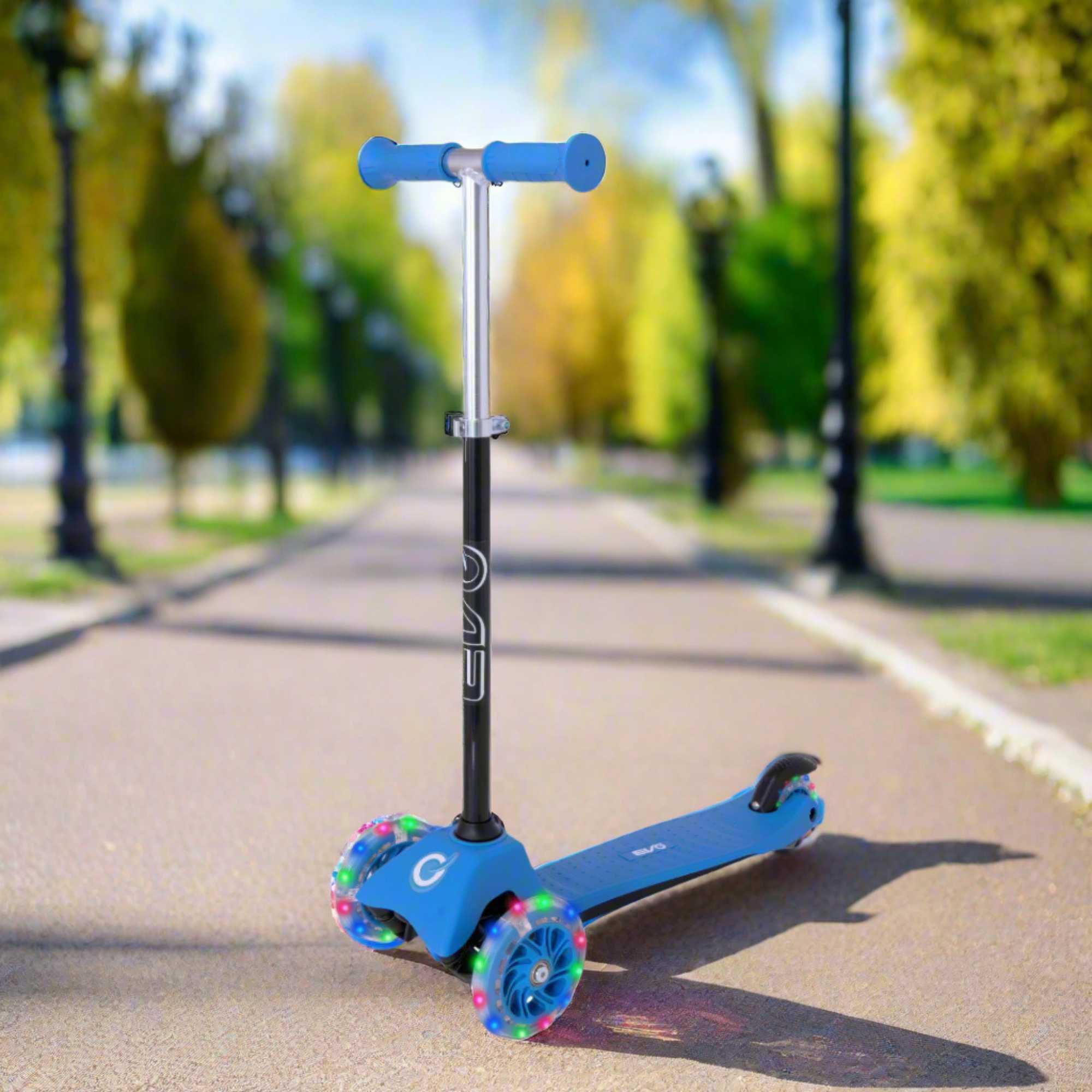 EVO Mini Cruiser Scooter, featuring a stable three-wheel design, adjustable handlebars, and lightweight, durable construction, perfect for young children’s outdoor adventures.