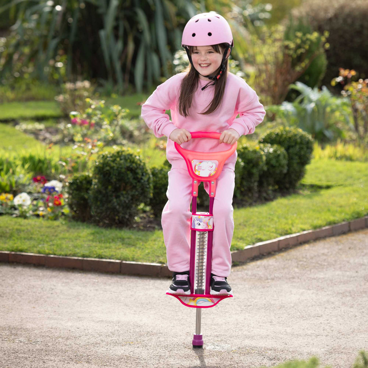 EVO Light Up Pogo Stick featuring bright colourful lights, sturdy frame, non-slip footpads, and comfortable handlebars, perfect for kids&#39; active outdoor play and exercise.