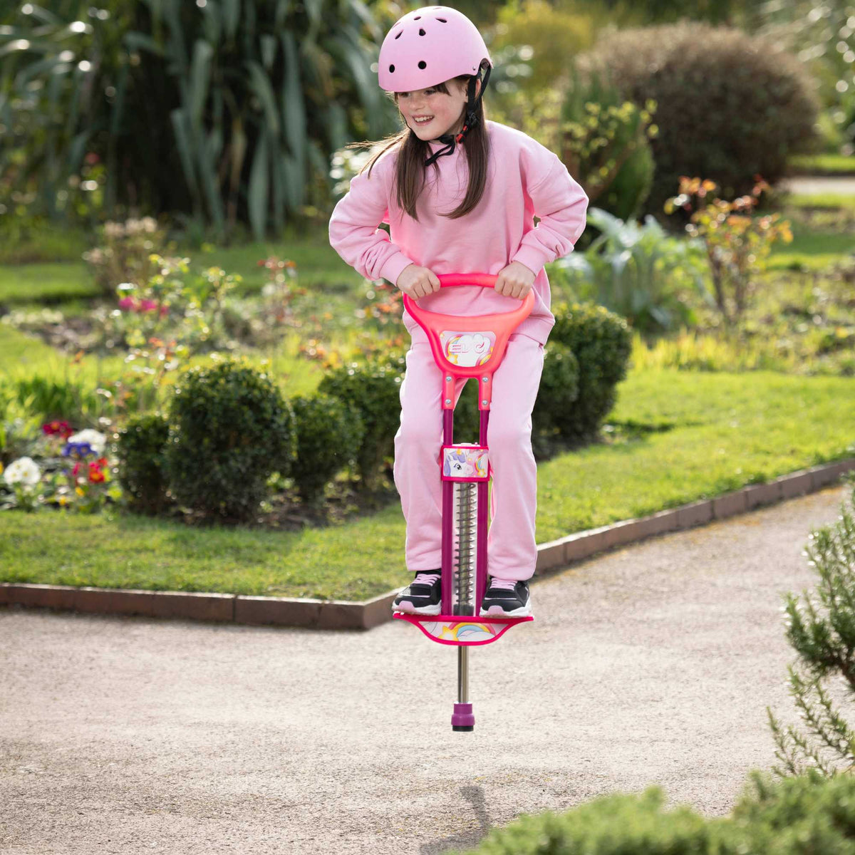 EVO Light Up Pogo Stick featuring bright colourful lights, sturdy frame, non-slip footpads, and comfortable handlebars, perfect for kids&#39; active outdoor play and exercise.