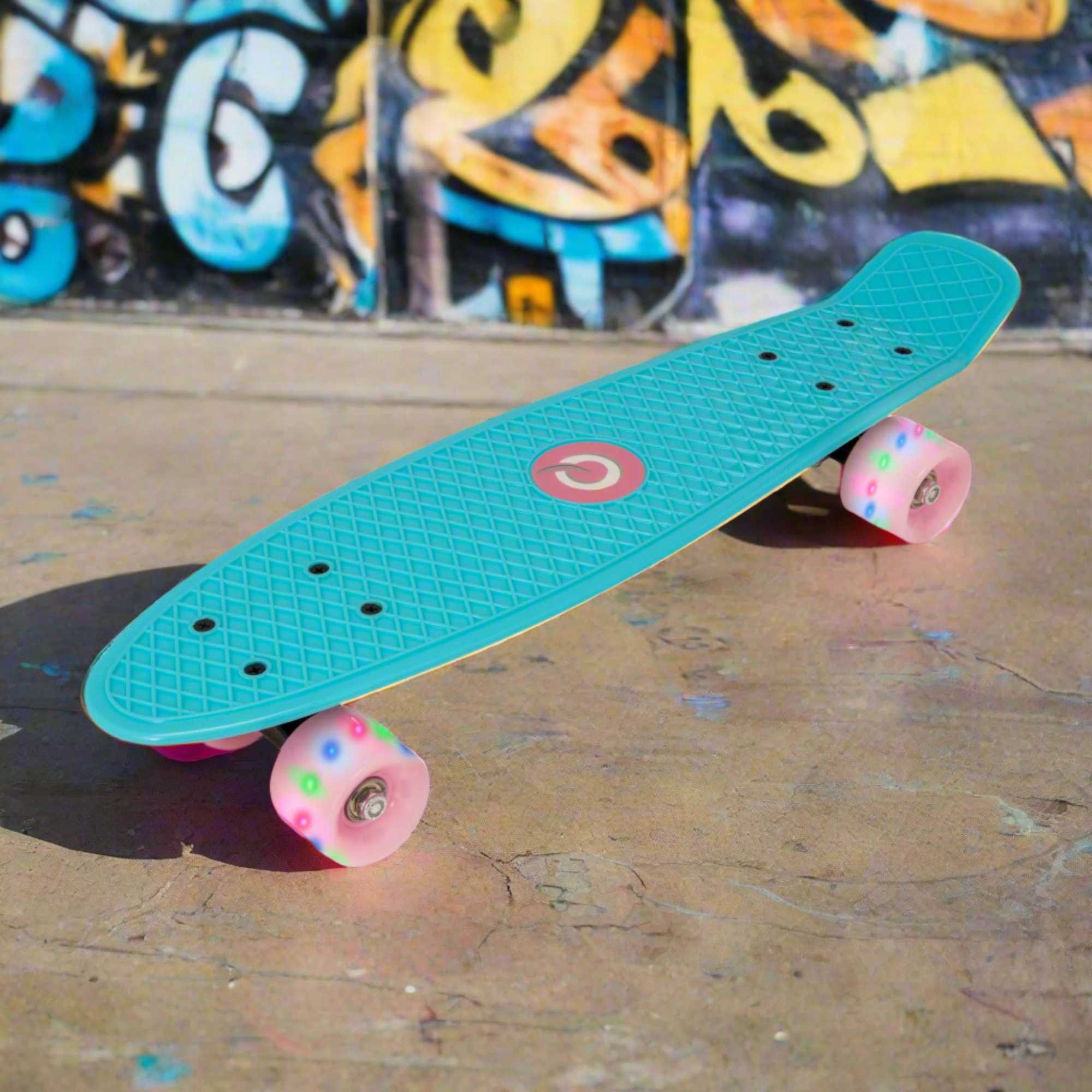 Children’s EVO 22-inch Penny Board with light-up wheels, showcasing a compact design and vibrant retro style, perfect for young riders. The board features a textured grip surface and smooth, illuminated wheels that light up during movement. 