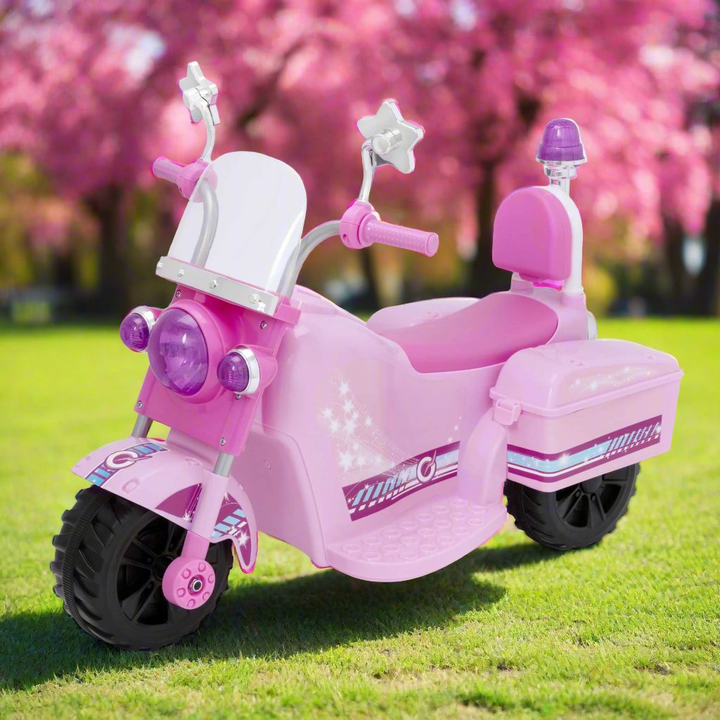 Image of the EVO Children&#39;s Electric Ride-On Shimmer Trike Toy. The trike is shown in an outdoor setting, highlighting its fun and adventurous appeal for young riders.