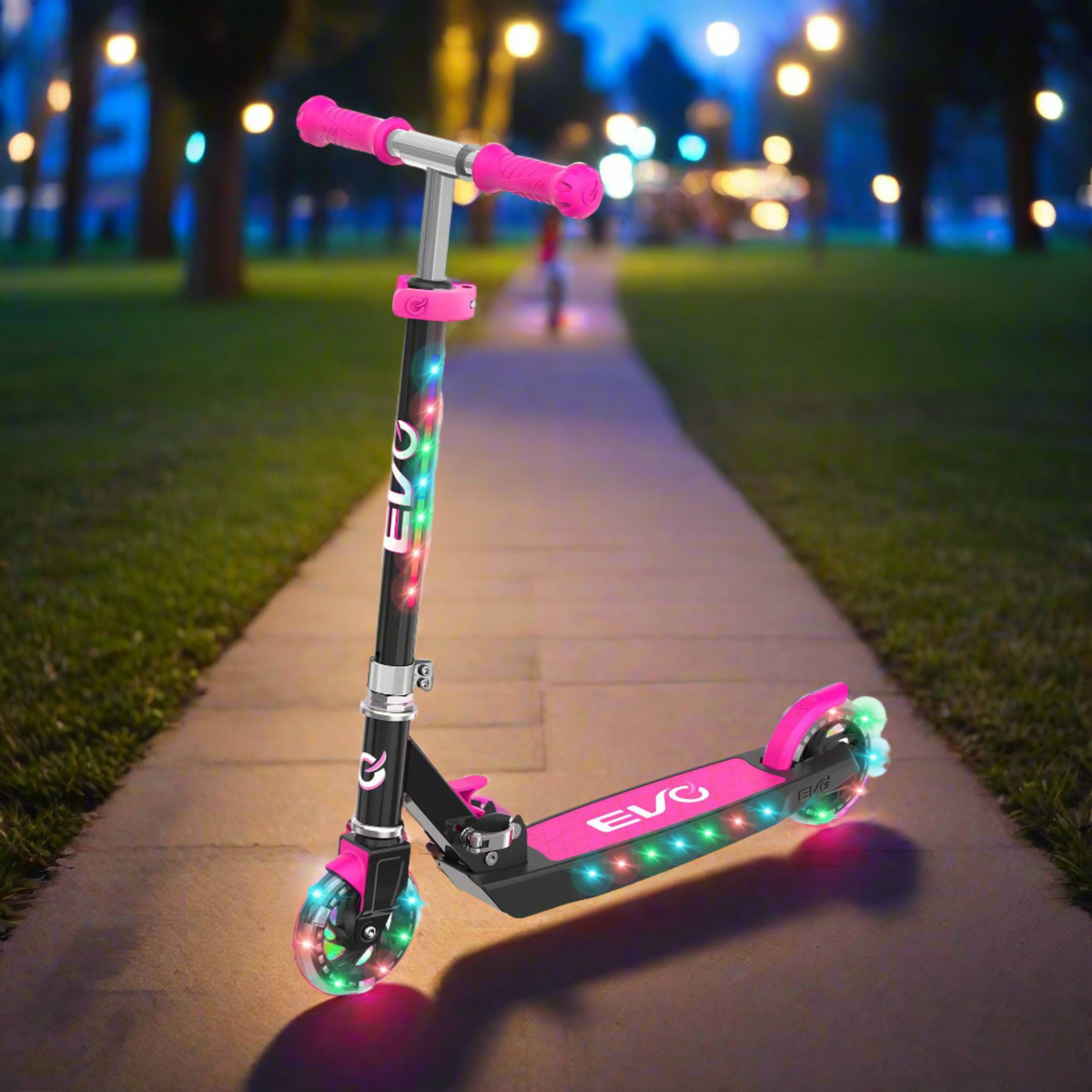 EVO Children&#39;s Light Up Light Blast Scooter for Kids Ages 5 and Up with LED Wheels and Adjustable Handlebar , perfect for enhancing motor skills and outdoor fun.