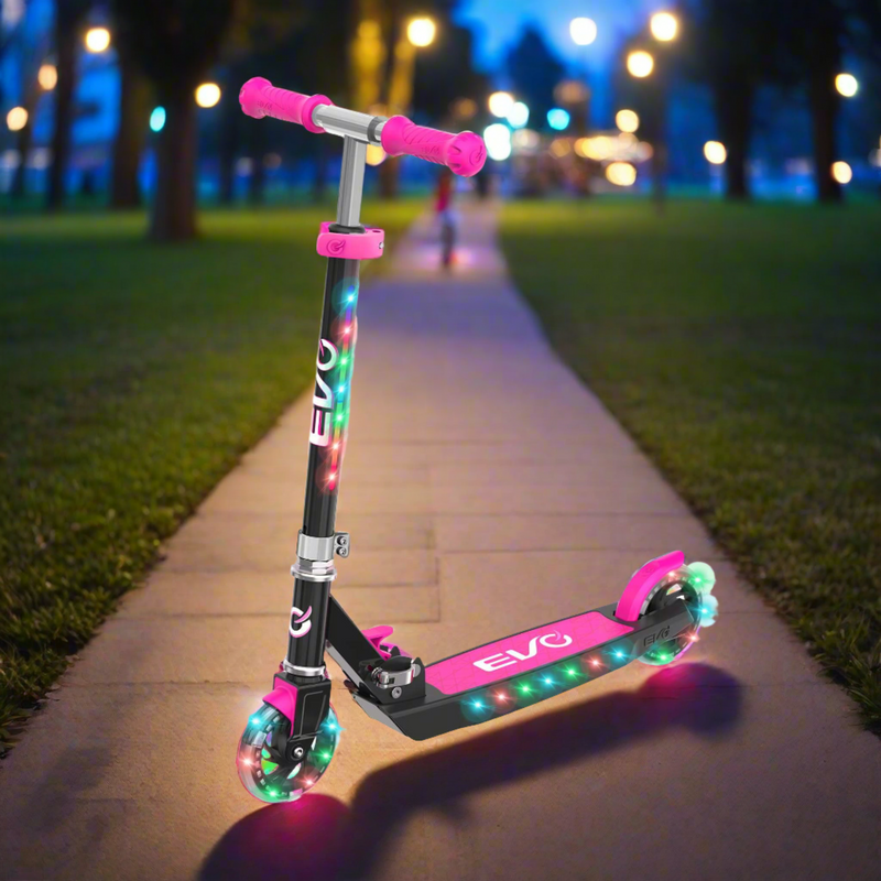 EVO Children's Light Up Light Blast Scooter for Kids Ages 5 and Up with LED Wheels and Adjustable Handlebar , perfect for enhancing motor skills and outdoor fun.