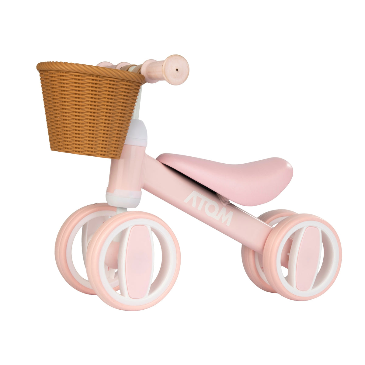pink toddlers bobble bike with a wicker basket.
