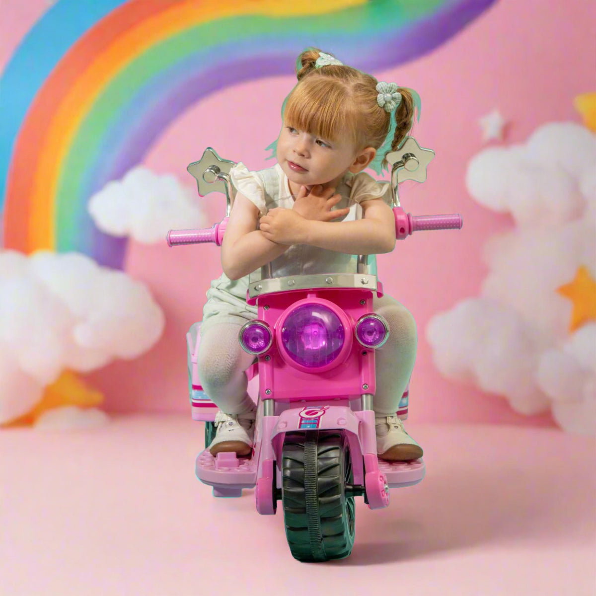 Image of the EVO Children&#39;s Electric Ride-On Shimmer Trike Toy. The trike is shown in an outdoor setting, highlighting its fun and adventurous appeal for young riders.