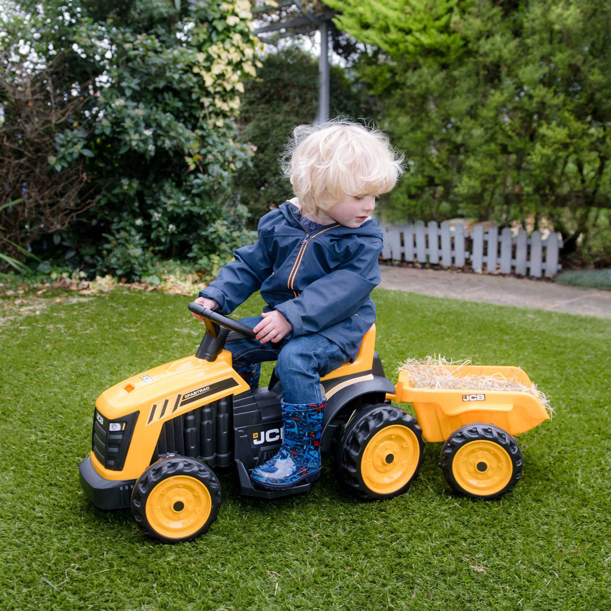 EVO JCB Battery Operated Tractor Ride-On for 2-year-olds, featuring a yellow and black JCB design, battery-powered operation, and a stable, comfortable ride for imaginative farm adventures.