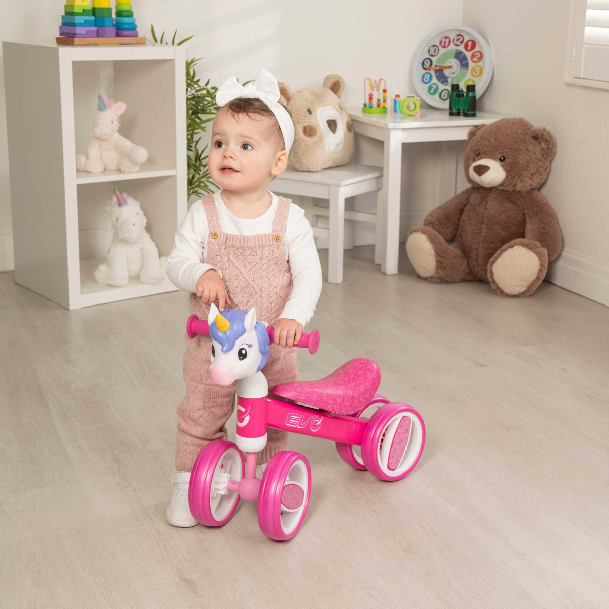 Fun and colourful EVO Character Heads Bobble Bike featuring adorable Unicorn and Dino designs for kids, perfect for teaching children balance and coordination.