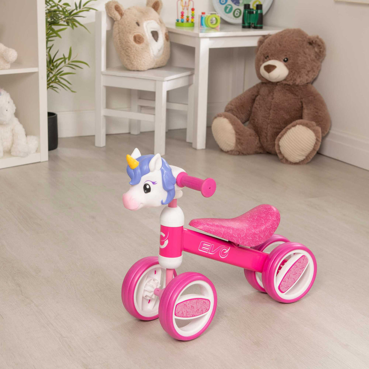 Fun and colourful EVO Character Heads Bobble Bike featuring adorable Unicorn and Dino designs for kids, perfect for teaching children balance and coordination.