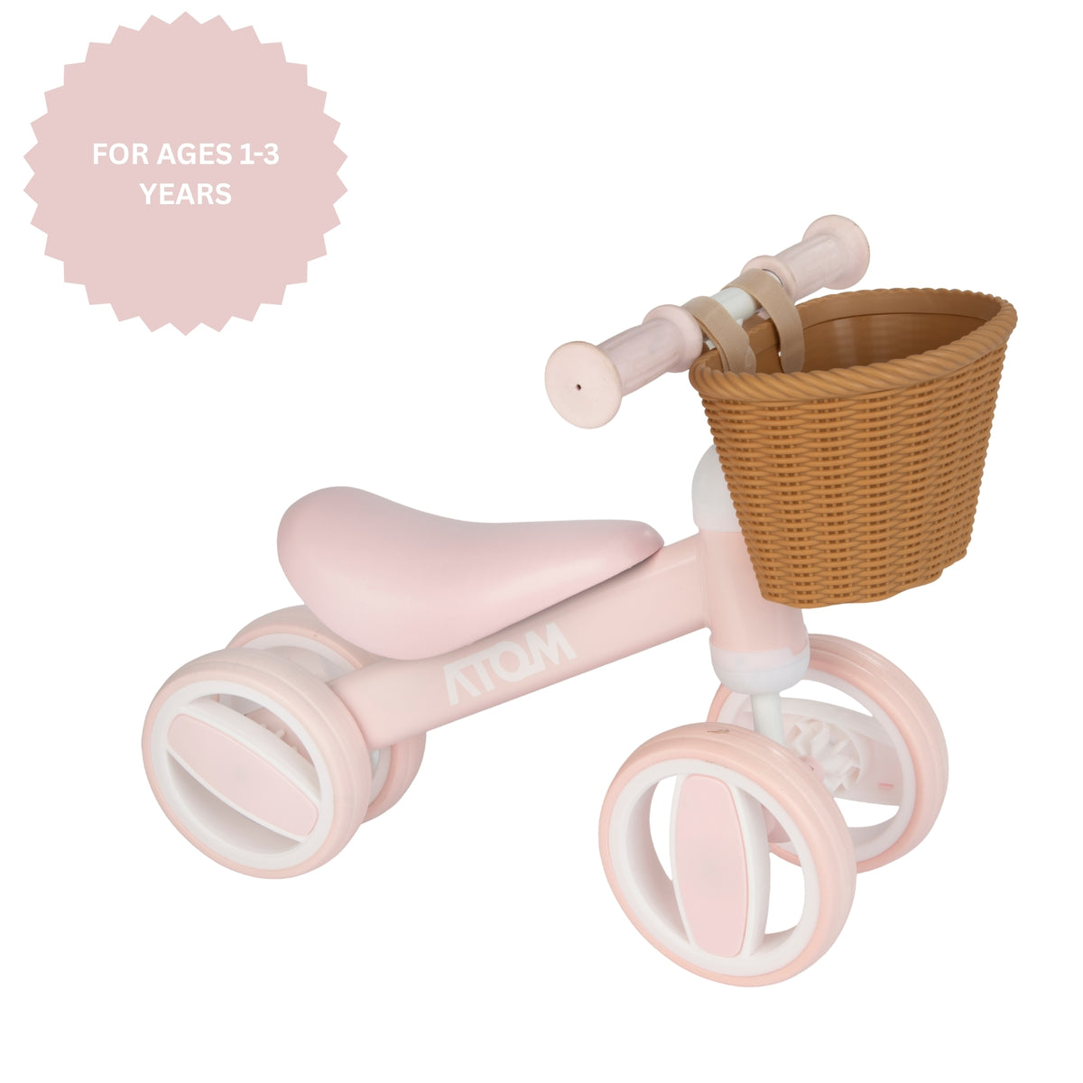 pink toddlers bobble bike with a wicker basket.