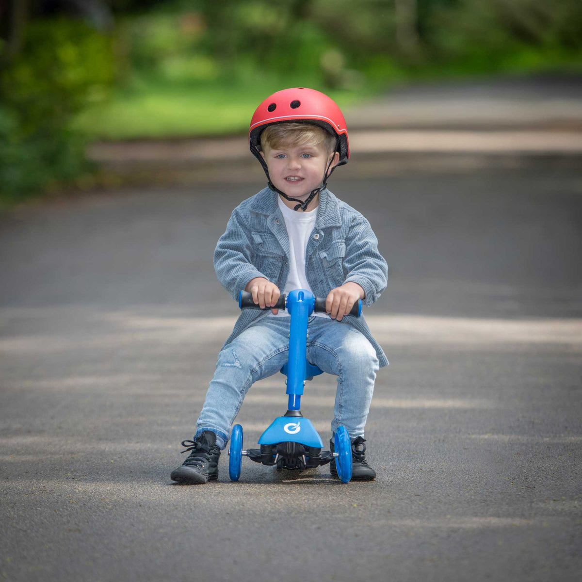 Children&#39;s EVO 3-in-1 Cruiser for ages 1+ in vibrant colours, offering adjustable features for growing kids, perfect for enhancing motor skills and outdoor fun.