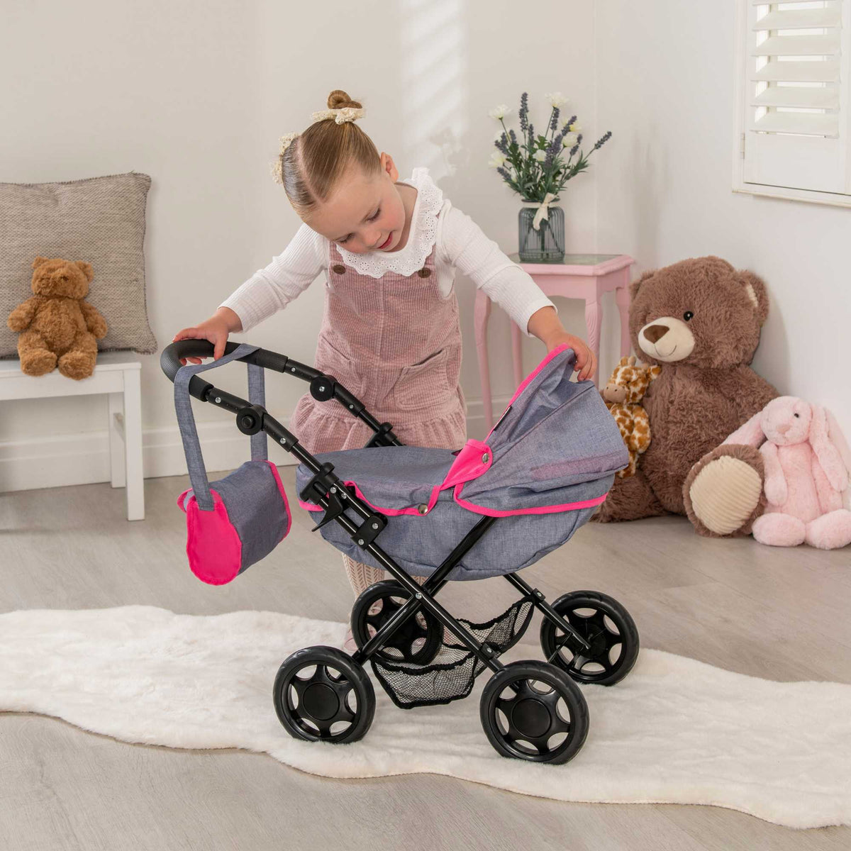 Mamas and Papas Junior Sweet Dreams Dolls Pram, featuring a vintage-inspired design with sturdy frame, adjustable handle height, and smooth-rolling wheels, perfect for imaginative play with dolls.