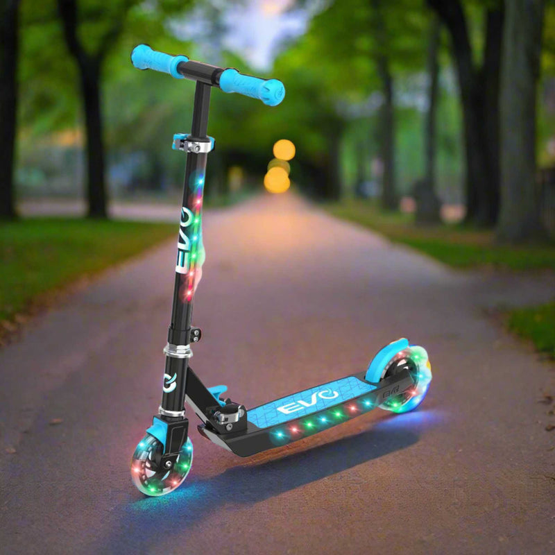 EVO Children's Light Up Light Blast Scooter for Kids Ages 5 and Up with LED Wheels and Adjustable Handlebar , perfect for enhancing motor skills and outdoor fun.