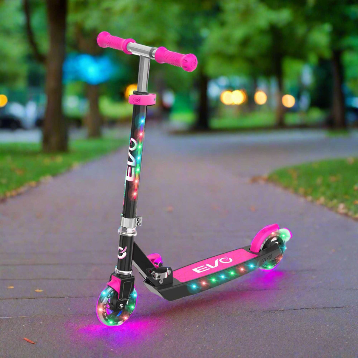 EVO Children&#39;s Light Up Light Blast Scooter for Kids Ages 5 and Up with LED Wheels and Adjustable Handlebar , perfect for enhancing motor skills and outdoor fun.