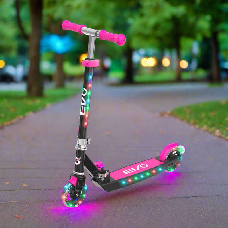 EVO Children's Light Up Light Blast Scooter for Kids Ages 5 and Up with LED Wheels and Adjustable Handlebar , perfect for enhancing motor skills and outdoor fun.