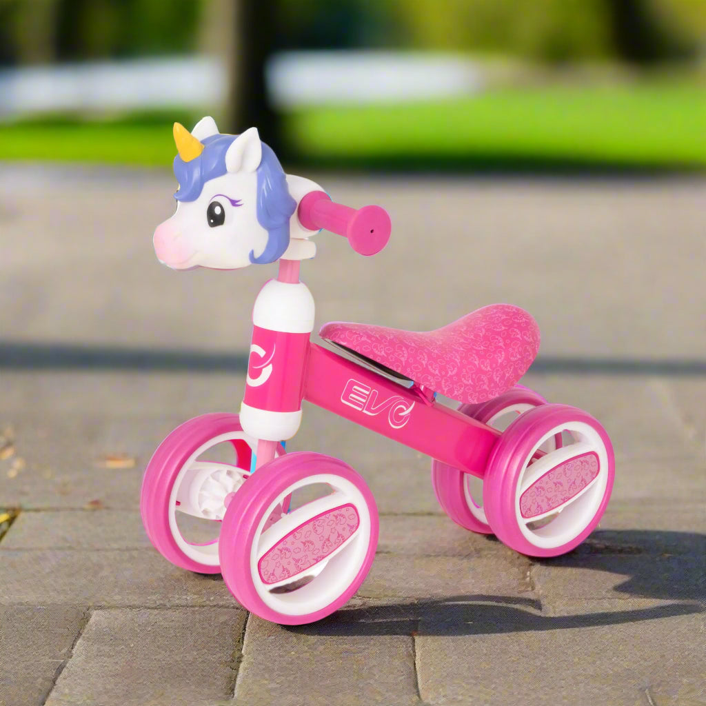 Fun and colourful EVO Character Heads Bobble Bike featuring adorable Unicorn and Dino designs for kids, perfect for teaching children balance and coordination.