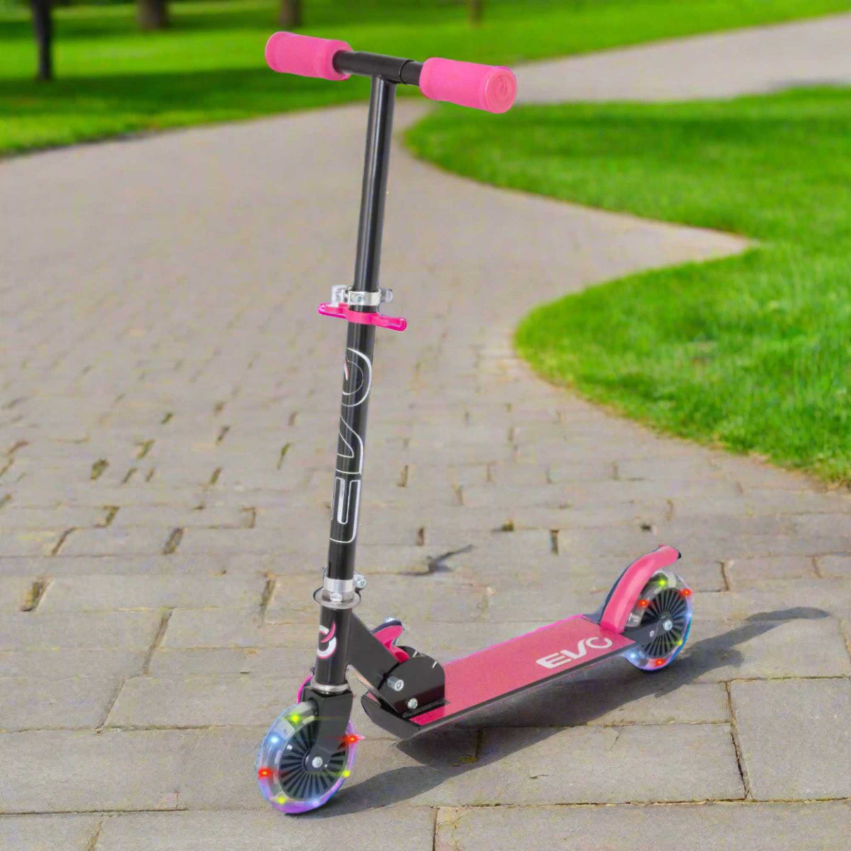 EVO Children&#39;s Light Up Inline Scooter for Kids Ages 5 and Up with LED Wheels and Adjustable Handlebar, perfect for enhancing motor skills and outdoor fun.