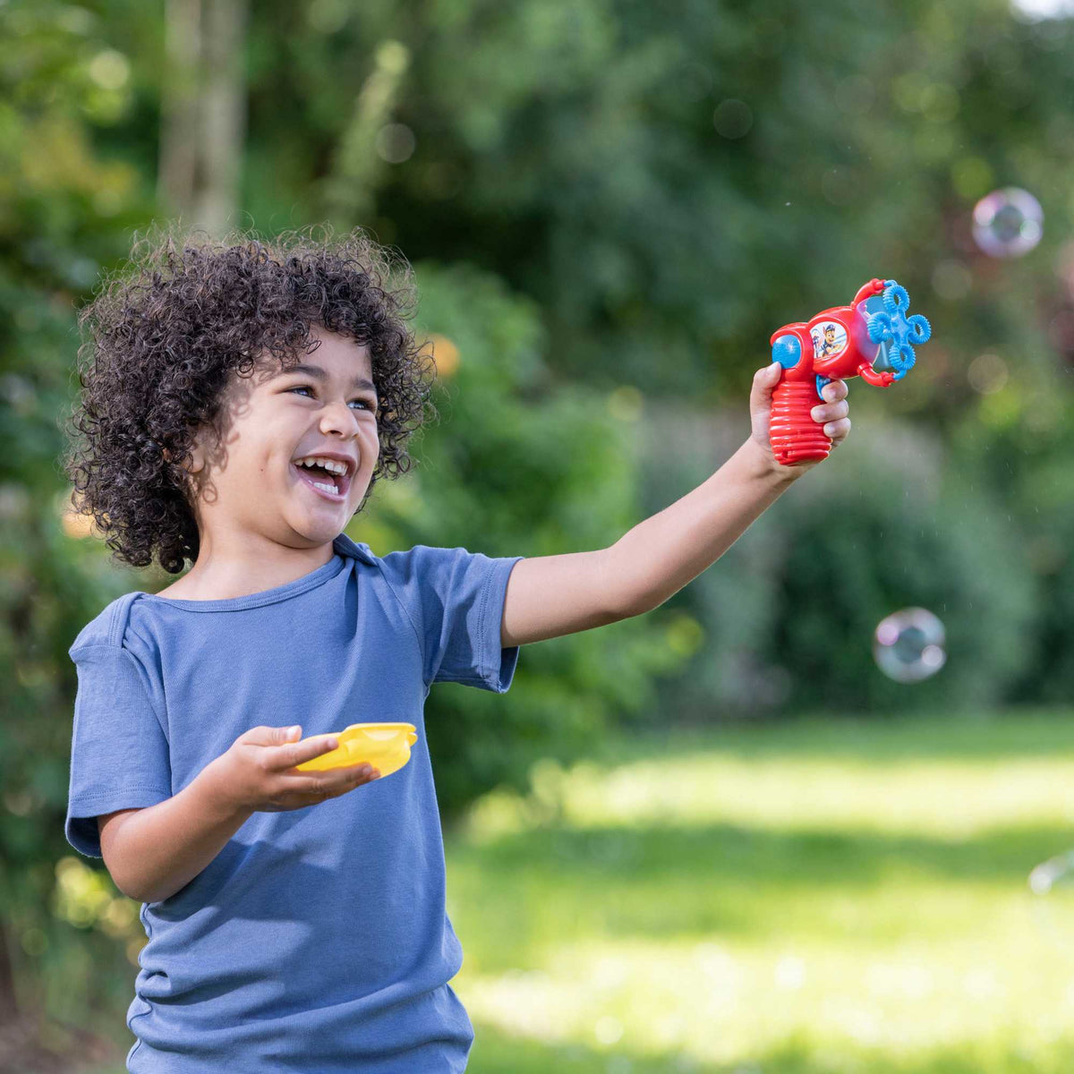 Paw Patrol Bubble Bundle featuring a bubble gun, bubble wands, and bubble solution - perfect for kids&#39; outdoor fun and playtime adventures!