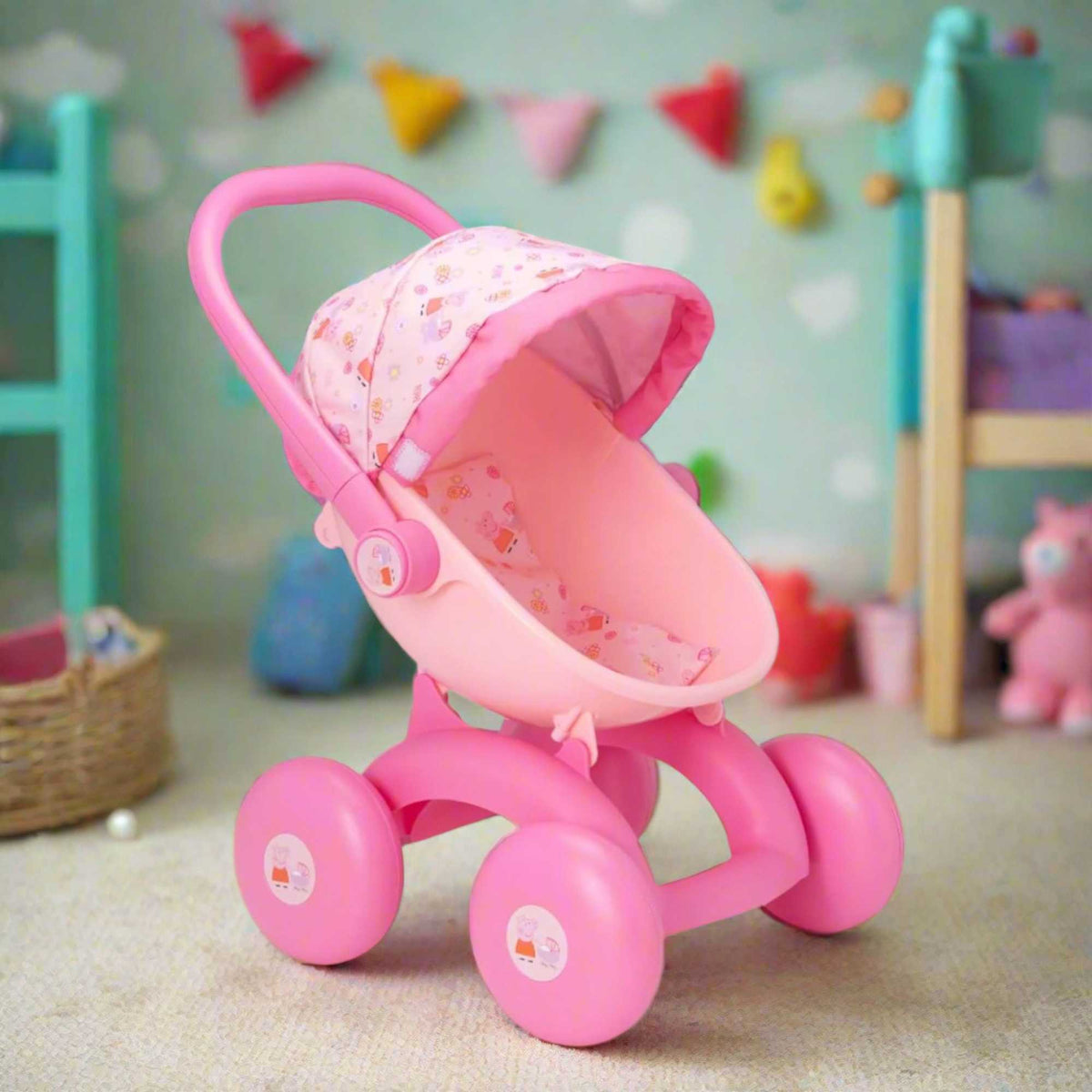 Peppa Pig 4-IN-1 My First Pram: A pink and white toy pram featuring Peppa Pig graphics, designed for toddlers with four versatile play modes, perfect for imaginative play and doll carrying.