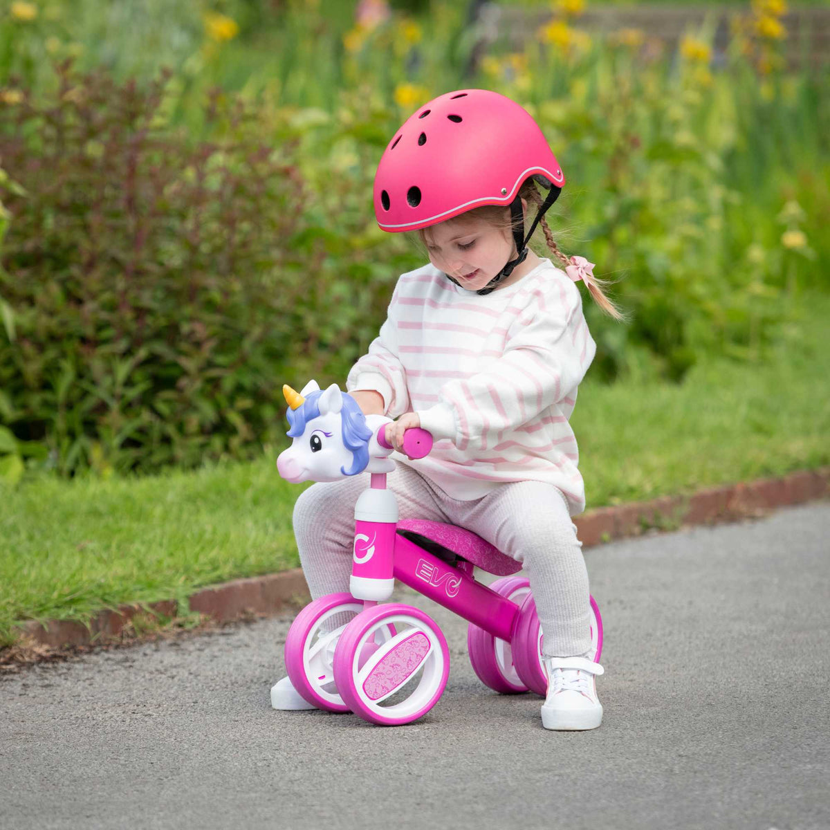 Fun and colourful EVO Character Heads Bobble Bike featuring adorable Unicorn and Dino designs for kids, perfect for teaching children balance and coordination.