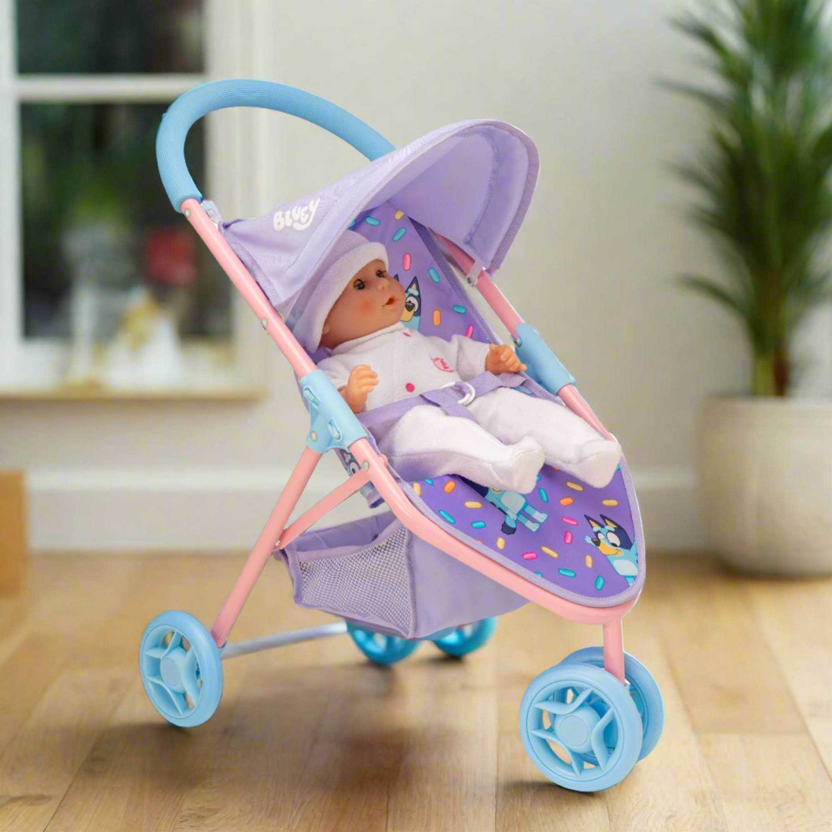 Bluey Jogger Dolls Pram - Sturdy and stylish pram designed for dolls, inspired by Bluey, perfect for active play and imaginative adventures.