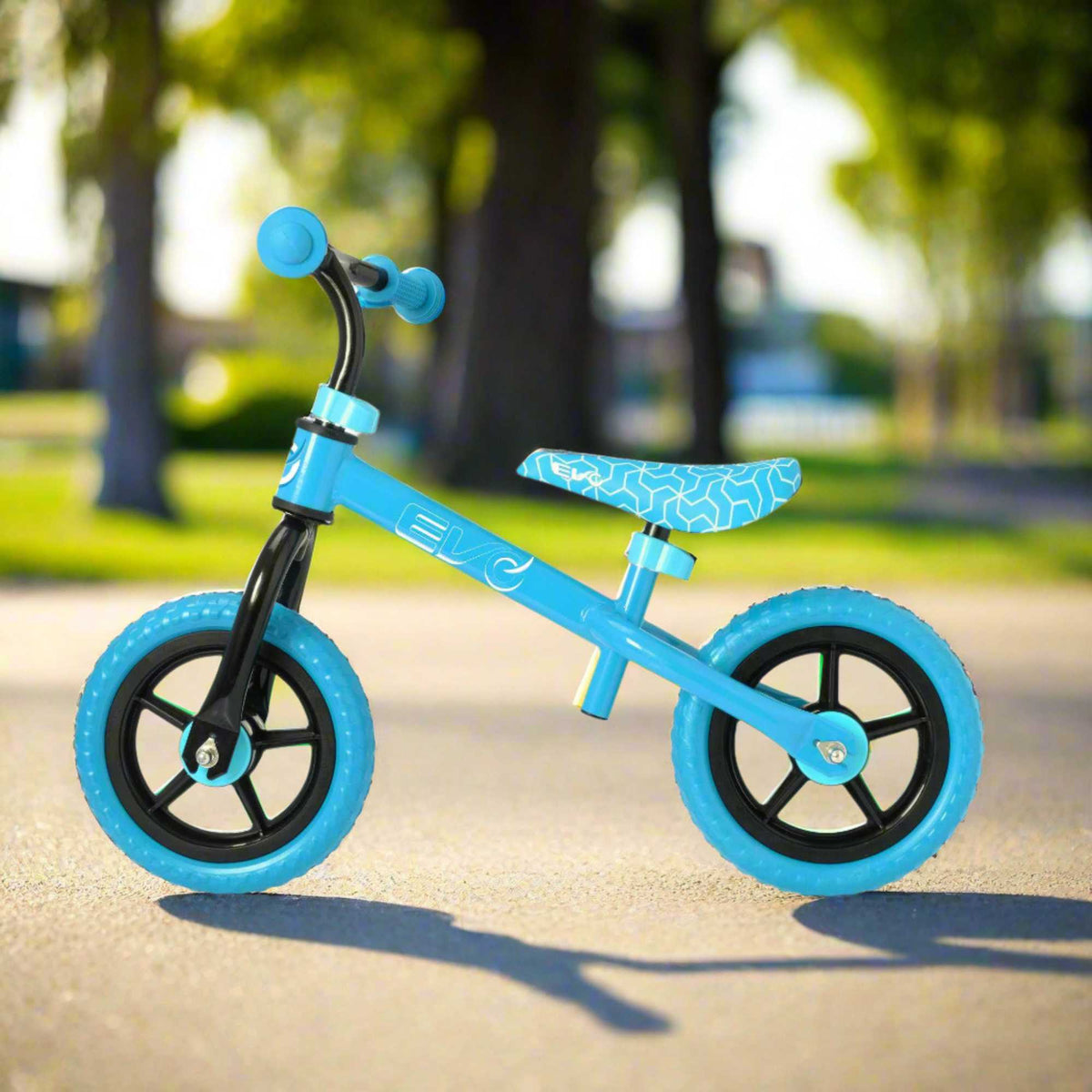 Child riding the EVO Balance Bike outdoors, showcasing the lightweight and durable design perfect for young learners to develop their balance and coordination skills