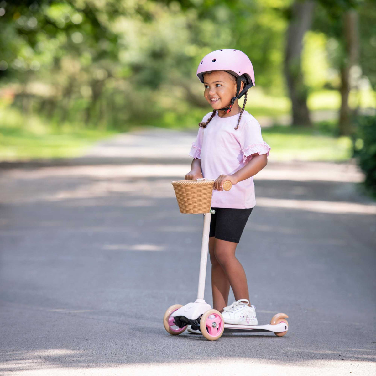 EVO Mini Cruiser Scooter with Basket, featuring a stable three-wheel design, adjustable handlebars, and lightweight, durable construction, perfect for young children’s outdoor adventures.