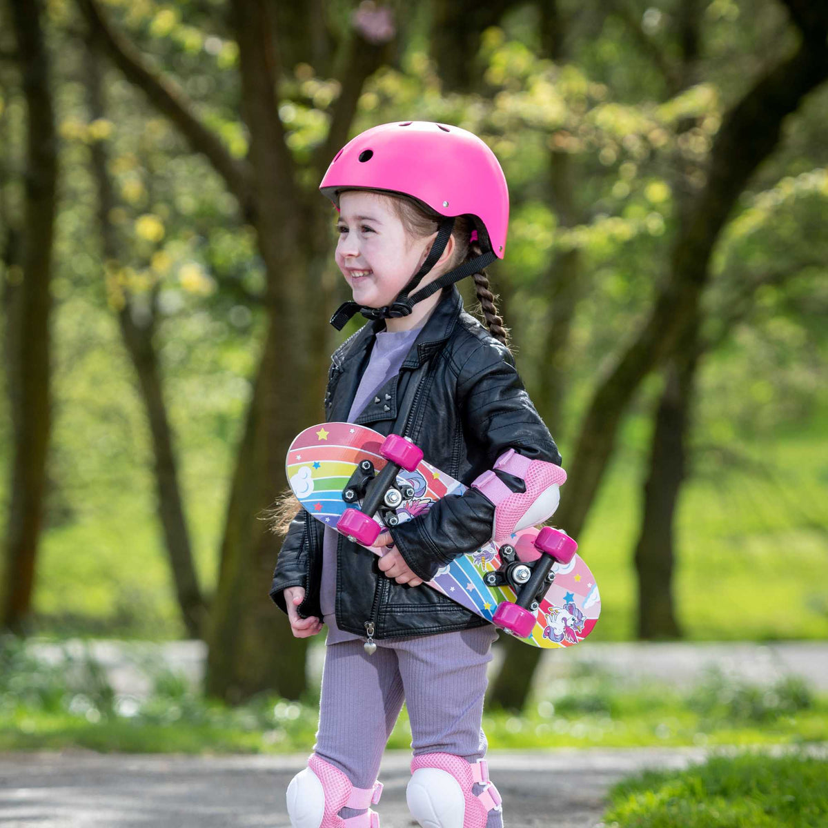 ATOM 17-inch Children&#39;s Skateboard with a vibrant graphic design, durable deck, and smooth-rolling wheels, ideal for young beginners learning to skateboard.