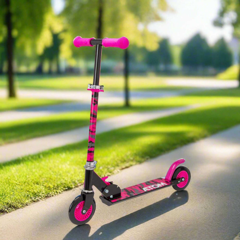 ATOM Inline 2-wheeled children's scooter in a stylish pink camouflage theme, featuring a durable design, eye-catching camouflage patterns, and a trendy look ideal for young riders