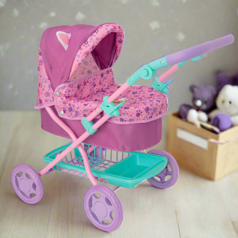 Adorable and colourful toy pram inspired by Gabby's Dollhouse, perfect for children to transport their favourite dolls and stuffed animals. Features include a sturdy frame, easy-to-push wheels, and playful designs with popular characters from the show. 