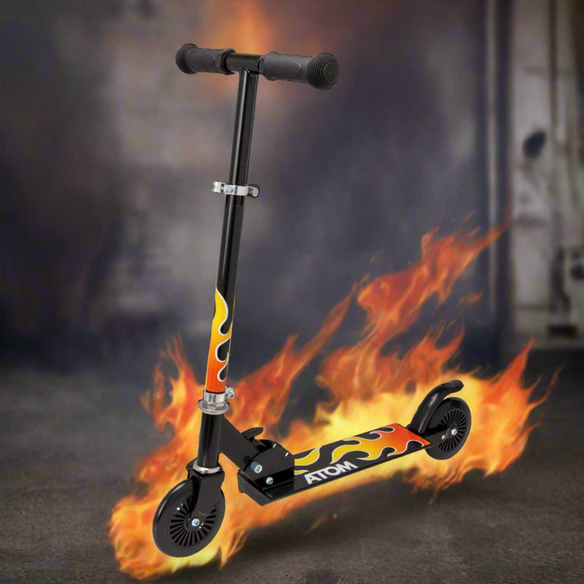 ATOM Inline 2-wheeled children&#39;s scooter in a sleek black flames theme, featuring a robust design, fiery graphics, and an exciting style perfect for young adventurers