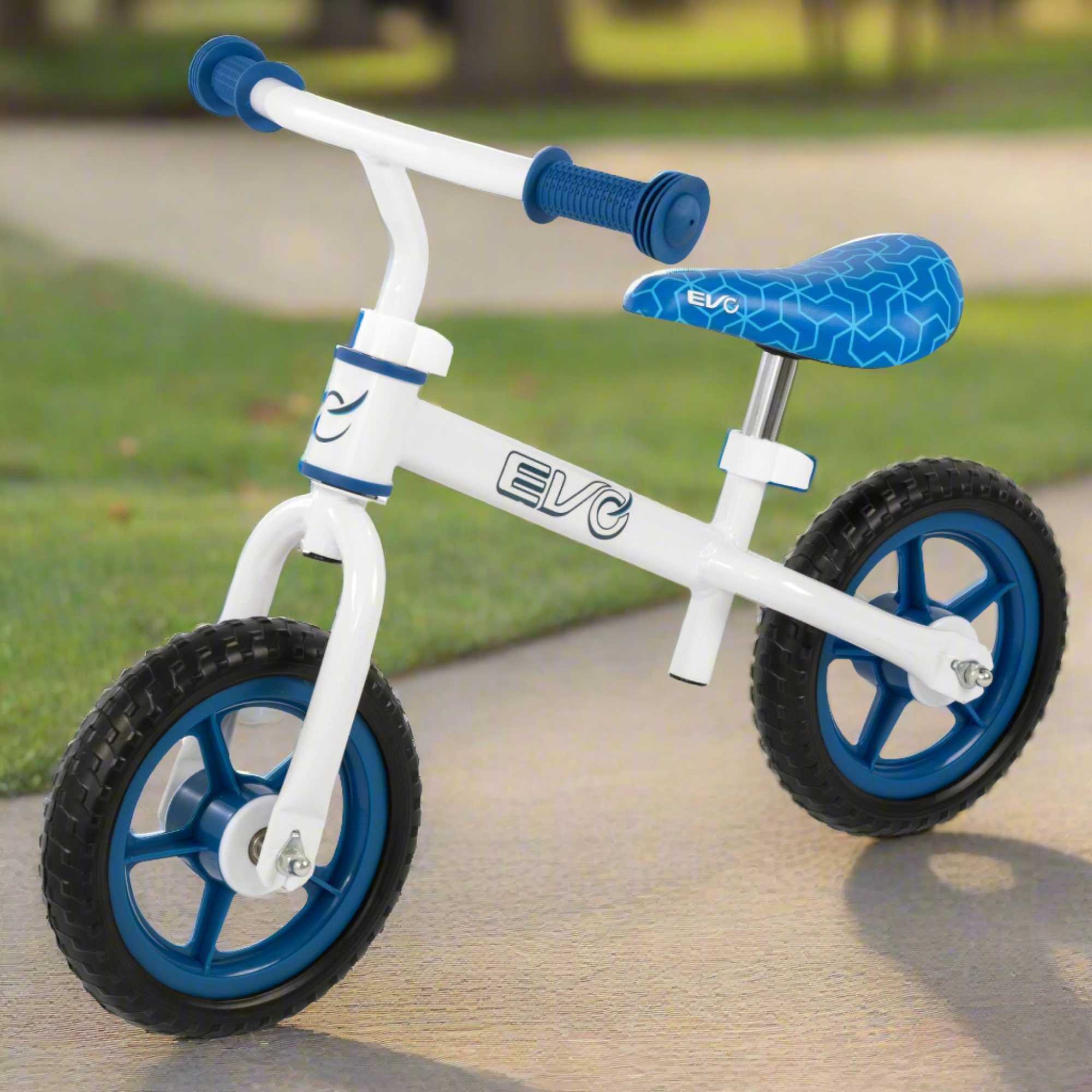 Child riding the EVO Balance Bike outdoors, showcasing the lightweight and durable design perfect for young learners to develop their balance and coordination skills
