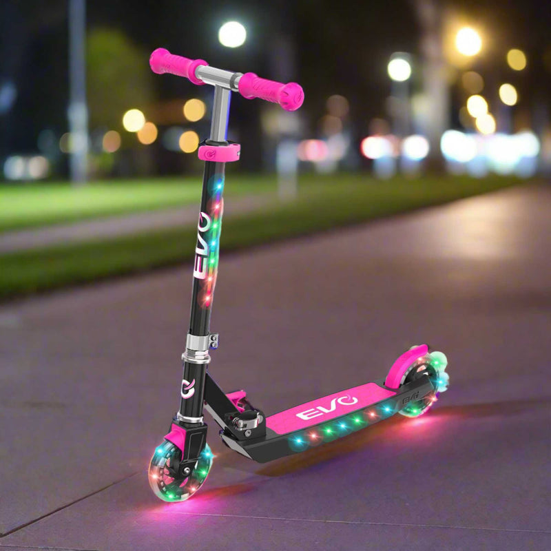 EVO Children's Light Up Light Blast Scooter for Kids Ages 5 and Up with LED Wheels and Adjustable Handlebar , perfect for enhancing motor skills and outdoor fun.