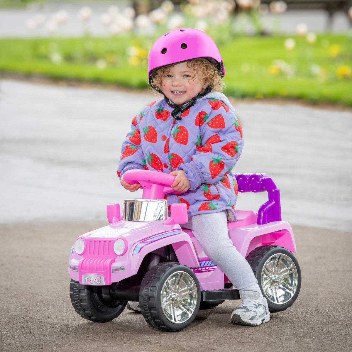 Pink EVO Shimmer 4x4 Ride-On Truck for kids ages 3 and up, featuring realistic design, durable construction, and all-terrain wheels for outdoor adventures.