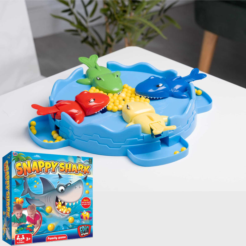 Snappy Shark Family Board Game, a thrilling competition where players push a shark’s tail to snap up the most balls. Perfect for all ages, offering hours of entertainment and giggles.