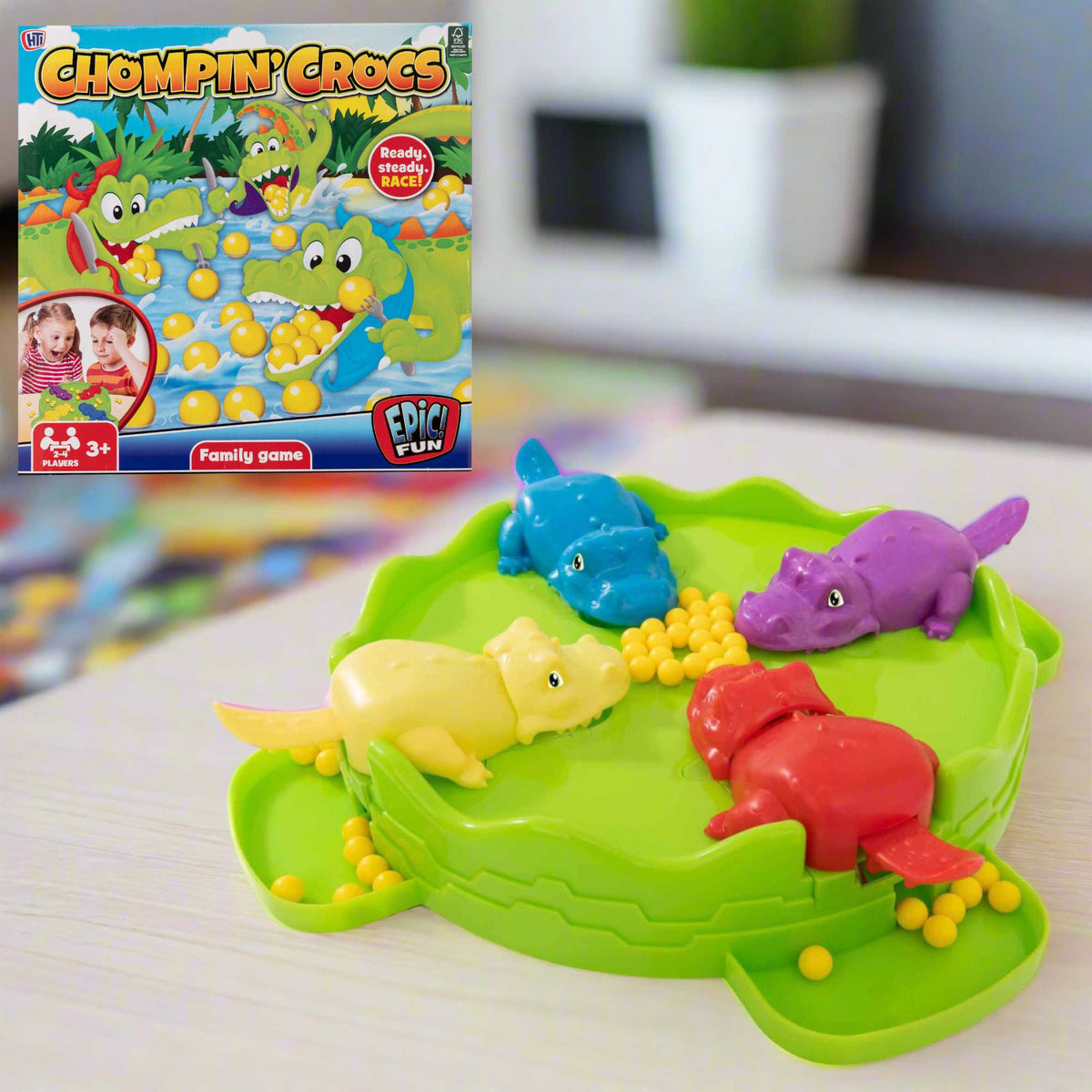 Chompin Crocs Family Board Game, a fun competition where players push a crocodile’s tail to chomp the most balls. Perfect for family entertainment, delivering hours of giggles and excitement.