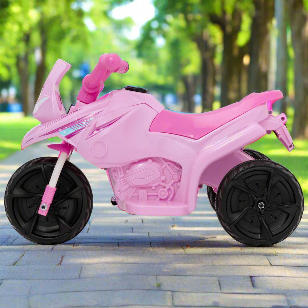 Electric pink EVO Shimmer Trike Ride-On for 2-year-olds, featuring a stable three-wheel design, ergonomic seat, and push-button acceleration for safe and exciting outdoor adventures.