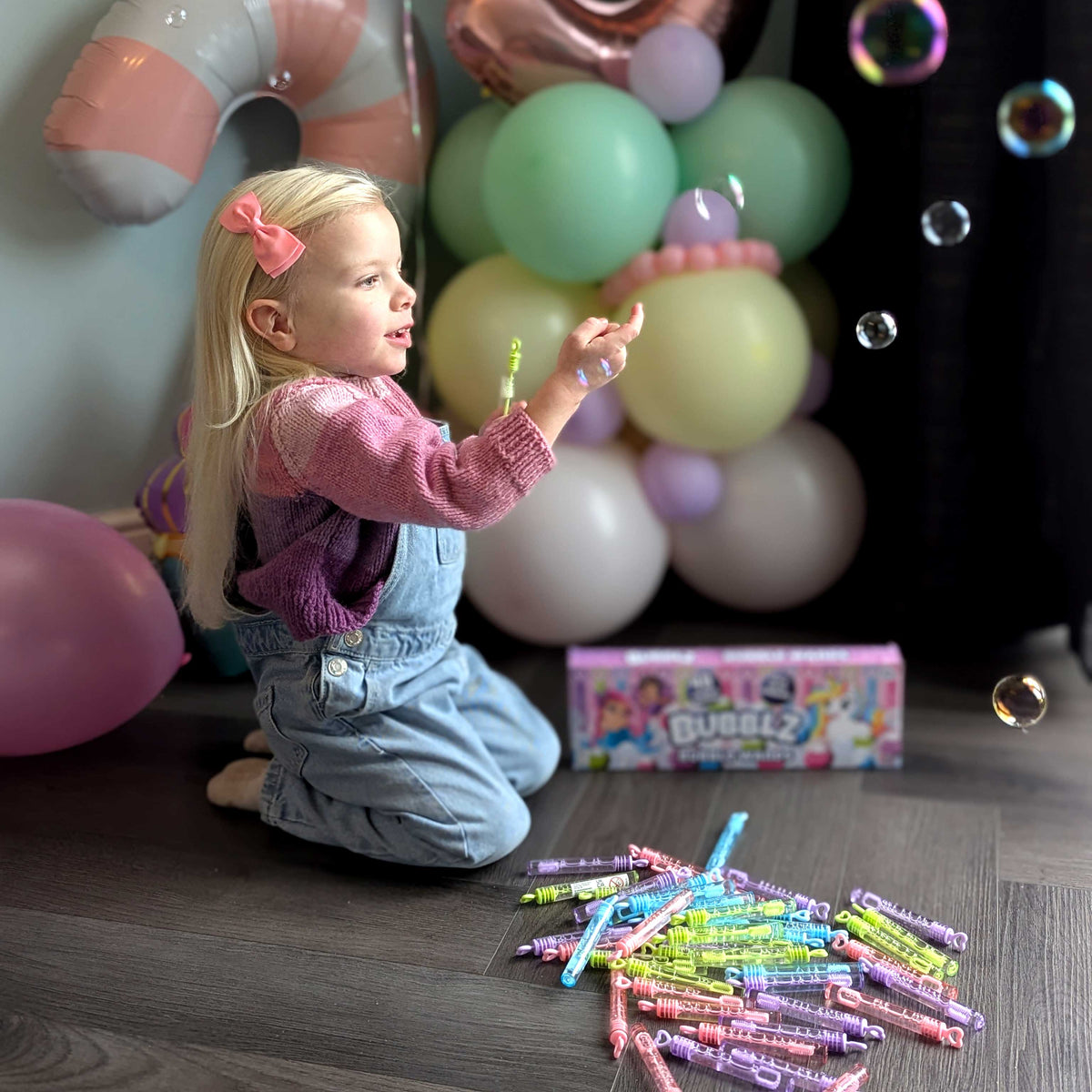 Bubblz 48 Pack of Bubble Wands: Includes Pastel bubble wands and bubble solution, perfect for outdoor play, parties, and group activities, designed for children and safe for all ages.