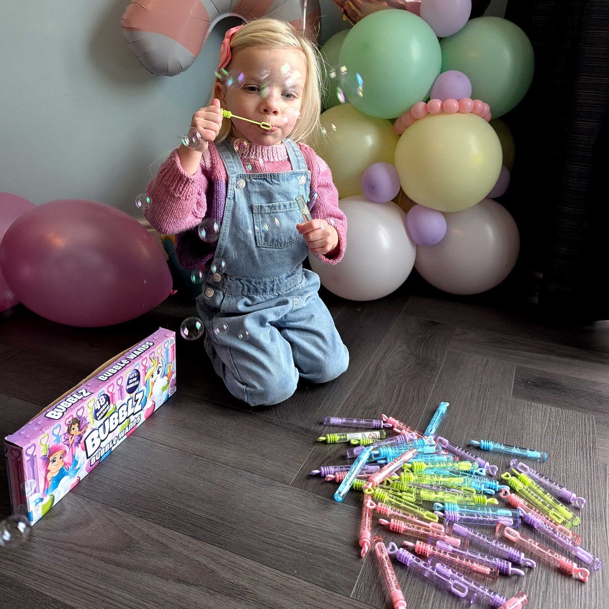 Bubblz 48 Pack of Bubble Wands: Includes Pastel bubble wands and bubble solution, perfect for outdoor play, parties, and group activities, designed for children and safe for all ages.