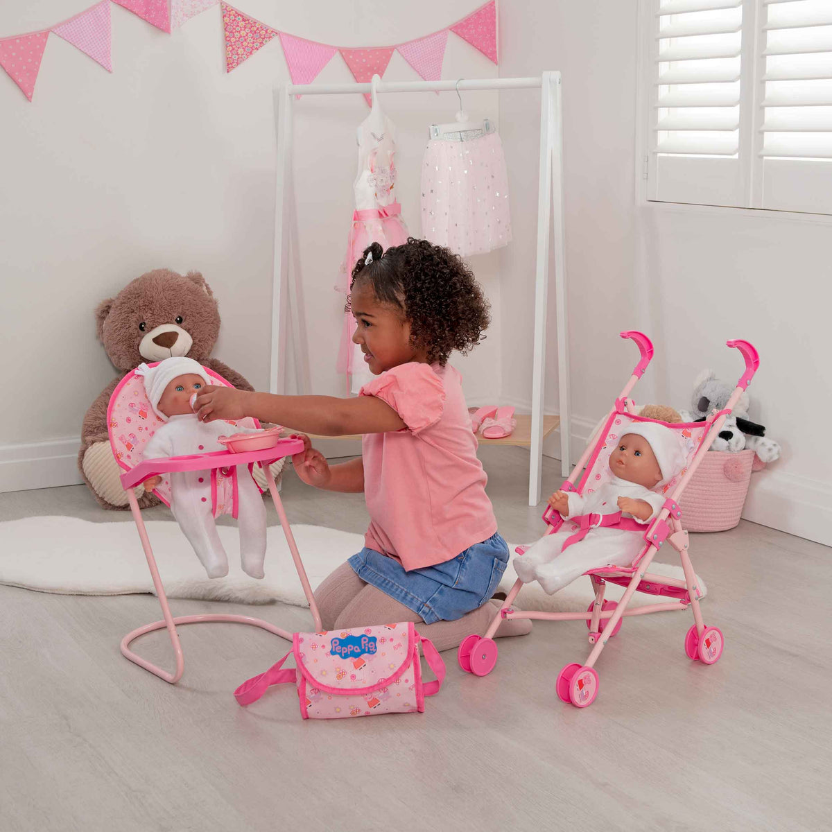 Peppa Pig Nursery Bundle - 7 Piece Playset: A colourful Peppa Pig-themed toy set including a high chair, stroller, Feeding set, perfect for toddlers&#39; imaginative play and doll care.