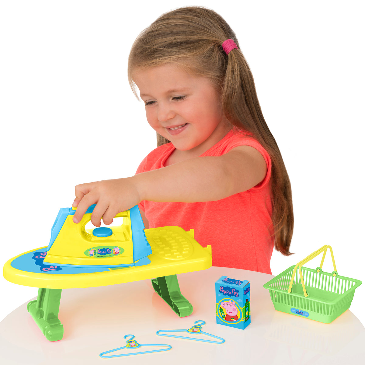 image of child playing with the peppa pig little helper set