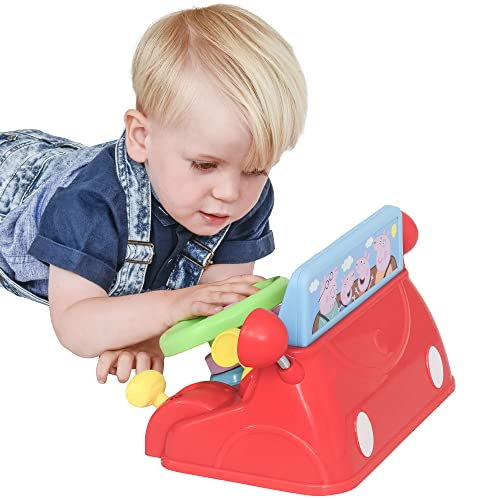 image of a child playing with peppa pigs mini driver roleplay toy
