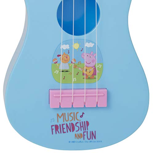 close up image of childrens Peppa Pig accoustic guitar
