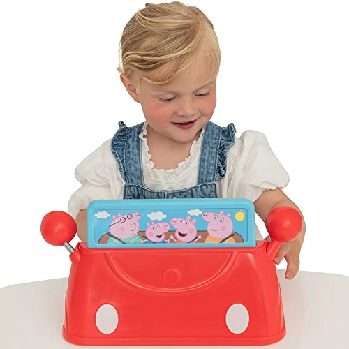 image of  a child playing with peppa pigs mini driver roleplay toy